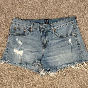 Distressed denim shorts